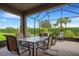 Enjoy the outdoors in this screened patio with seating area at 668 Cordoba Dr, Davenport, FL 33837