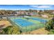 Enjoy the view of well-maintained tennis courts at 668 Cordoba Dr, Davenport, FL 33837