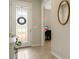 Entryway with tile floors and view into home office at 668 Cordoba Dr, Davenport, FL 33837