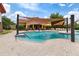 Resort-style pool with shaded seating and a relaxing atmosphere at 668 Cordoba Dr, Davenport, FL 33837