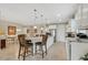 Open kitchen with large island and seating area at 668 Cordoba Dr, Davenport, FL 33837