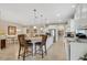 Eat-in kitchen with island and views to the living room at 668 Cordoba Dr, Davenport, FL 33837