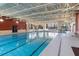 Indoor lap pool with multiple lanes, ideal for fitness enthusiasts at 668 Cordoba Dr, Davenport, FL 33837