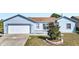 Image 1 of 42: 243 Bedford Dr, Kissimmee