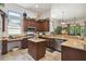 Open kitchen with island and ample cabinet storage at 806 Ebb Tide Ln, Poinciana, FL 34759
