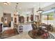 Eat-in kitchen with a table and chairs, open to the living area at 806 Ebb Tide Ln, Poinciana, FL 34759