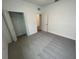 Well-lit bedroom featuring a walk-in closet and carpet flooring at 5306 Maddie Dr, Haines City, FL 33844