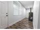 Laundry room with new flooring and water heater at 1419 36Th St, Orlando, FL 32839