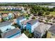 Aerial view of a two-story house in a vibrant community at 3044 Salted Rim Rd, Kissimmee, FL 34747