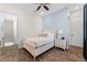 Charming bedroom with a double bed and light wood floors at 3044 Salted Rim Rd, Kissimmee, FL 34747
