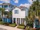 Quaint two-story house with yellow chairs on porch at 3044 Salted Rim Rd, Kissimmee, FL 34747
