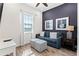 Relaxing living area with a comfortable sofa and stylish decor at 3044 Salted Rim Rd, Kissimmee, FL 34747