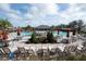 Resort-style pool with plenty of lounge chairs and umbrellas at 1843 Brockridge Rd, Kissimmee, FL 34744
