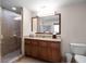 Bathroom with shower, vanity, and granite countertop at 12539 Floridays Resort Dr # 305-D, Orlando, FL 32821