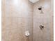 Large walk-in shower with tiled walls at 12539 Floridays Resort Dr # 305-D, Orlando, FL 32821