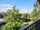 Enjoy scenic views of the lake and community amenities from your balcony at 12539 Floridays Resort Dr # 305-D, Orlando, FL 32821