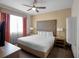 King-size bed, large headboard and plenty of bedside tables at 12539 Floridays Resort Dr # 305-D, Orlando, FL 32821