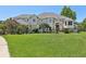 Two-story house with a large front yard at 9502 Hempel Cove Blvd, Windermere, FL 34786
