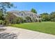 Two-story house with manicured lawn at 9502 Hempel Cove Blvd, Windermere, FL 34786