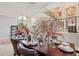 Formal dining room with a large table and hardwood floors at 9502 Hempel Cove Blvd, Windermere, FL 34786