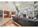 Open living room with hardwood floors and a fireplace at 9502 Hempel Cove Blvd, Windermere, FL 34786