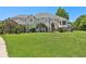 Two-story house with manicured lawn at 9502 Hempel Cove Blvd, Windermere, FL 34786