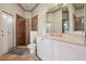 Clean bathroom with a shower, toilet and updated vanity at 9502 Hempel Cove Blvd, Windermere, FL 34786