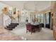 Formal dining room with a large table and chandelier at 9502 Hempel Cove Blvd, Windermere, FL 34786