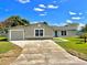 Newly built single-Gathering home with a driveway at 705 Harland Ct, Kissimmee, FL 34758