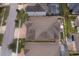 Property overview showing home's roofline and backyard at 2518 Fontaine Dr, Kissimmee, FL 34741