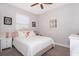 Cozy bedroom with a queen bed and soft color palette at 2518 Fontaine Dr, Kissimmee, FL 34741