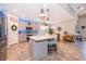 Modern kitchen with an island, stainless steel appliances, and ample counter space at 2518 Fontaine Dr, Kissimmee, FL 34741