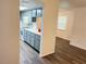 Open concept living area showing a view into the kitchen at 414 Banana Cay Dr # I, South Daytona, FL 32119