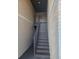 Interior stairwell with metal railing at 414 Banana Cay Dr # I, South Daytona, FL 32119