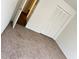 Simple bedroom with carpeted floors and a large closet at 414 Banana Cay Dr # I, South Daytona, FL 32119