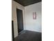 Building entryway with dark door and fire extinguisher at 414 Banana Cay Dr # I, South Daytona, FL 32119