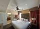 King-size bed and ensuite bathroom with tub at 12539 Floridays Resort Dr # 104 D, Orlando, FL 32821