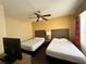 Two twin beds in a well-lit bedroom at 12539 Floridays Resort Dr # 104 D, Orlando, FL 32821