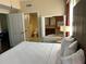 King-size bed with ensuite bathroom access at 12539 Floridays Resort Dr # 104 D, Orlando, FL 32821