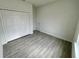 Bright bedroom with double door closet and tile floors at 274 Elm Ct, Kissimmee, FL 34759