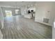Open concept living room, kitchen, and dining area with tile floors at 274 Elm Ct, Kissimmee, FL 34759