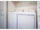 Convenient laundry room with washer and dryer at 8919 Stinger Dr, Davenport, FL 33896