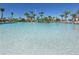 Large community pool with clear water ideal for relaxing at 8919 Stinger Dr, Davenport, FL 33896