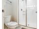 Bathroom with toilet and shower stall at 8919 Stinger Dr, Davenport, FL 33896
