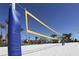 Beach volleyball court with sand and a net at 8919 Stinger Dr, Davenport, FL 33896