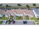 Aerial view of townhomes with individual garages at 8919 Stinger Dr, Davenport, FL 33896