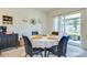 Dining area with sliding glass doors leading to backyard at 320 Boardwalk Ave, Haines City, FL 33844