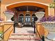 Relaxing community patio with seating and planters at 573 Viola Dr, Davenport, FL 33837