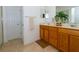 Bathroom with double vanity and tile floor at 573 Viola Dr, Davenport, FL 33837