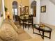 Elegant dining room with a table set for 6 and access to the kitchen at 573 Viola Dr, Davenport, FL 33837